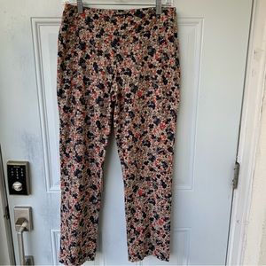 ZOZO. Tan pants w/multiple colored geo prints, zipper on side.Stretch ma…